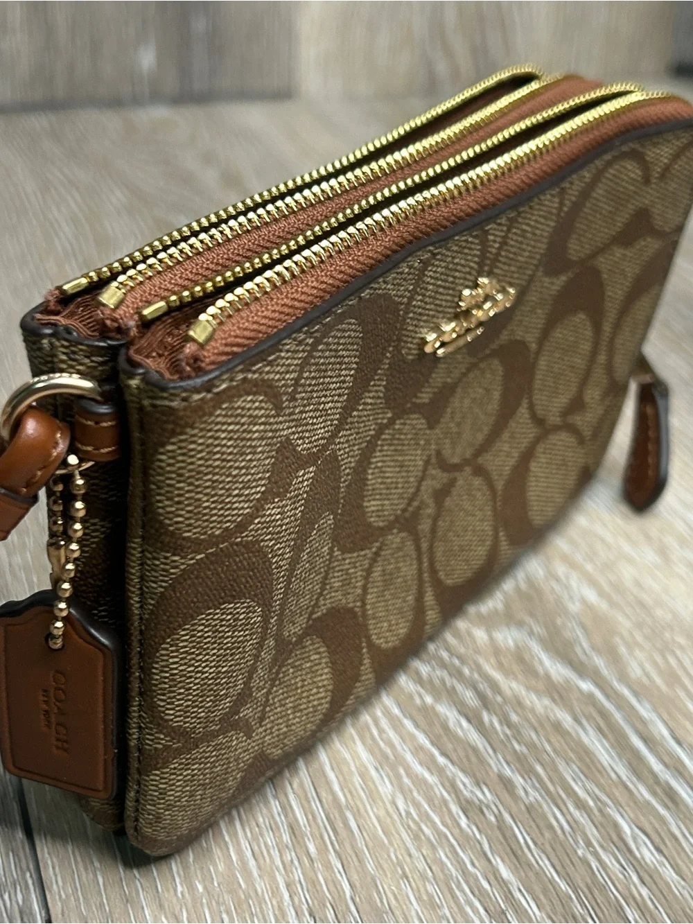 COACH Double Zip Wristlet in Signature Canvas Khaki Saddle Brown Wallet⁠